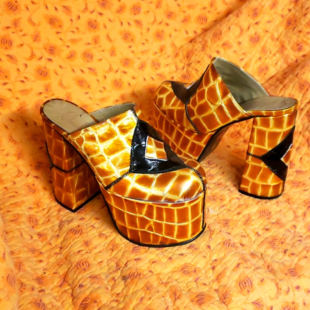 MORE LUICHINY PLATFORMS. These real leather mules are just to die fo, eh?